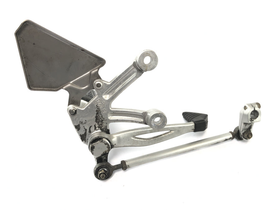 Benelli TNT 1130 [2009] - Driver's left footrest system with shift linkage.