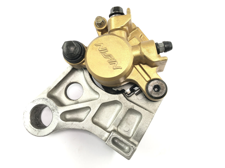 Honda CBR 600 RR PC37 [2004] - Bremssattel hinten Nissin mit Halterung