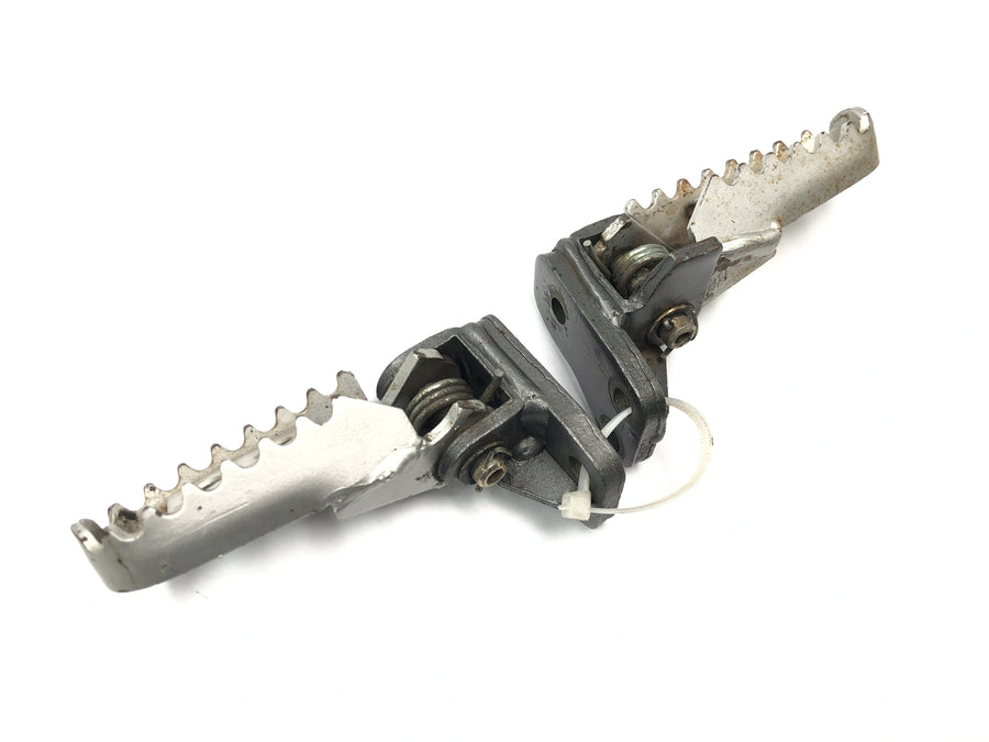 Husqvarna TE 610 E Dual H7 [1999] - Driver footrests with spring mechanism set pair