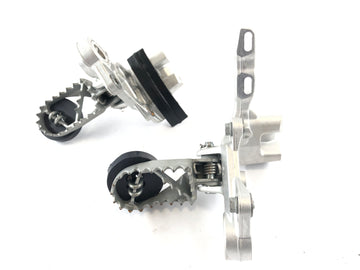 Husqvarna 701 Supermoto [2019] - Footrests right and left with holder - 0